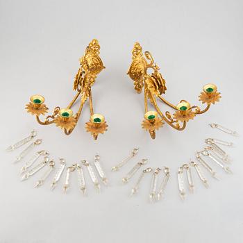 A pair of wall sconces from the late 19th century.