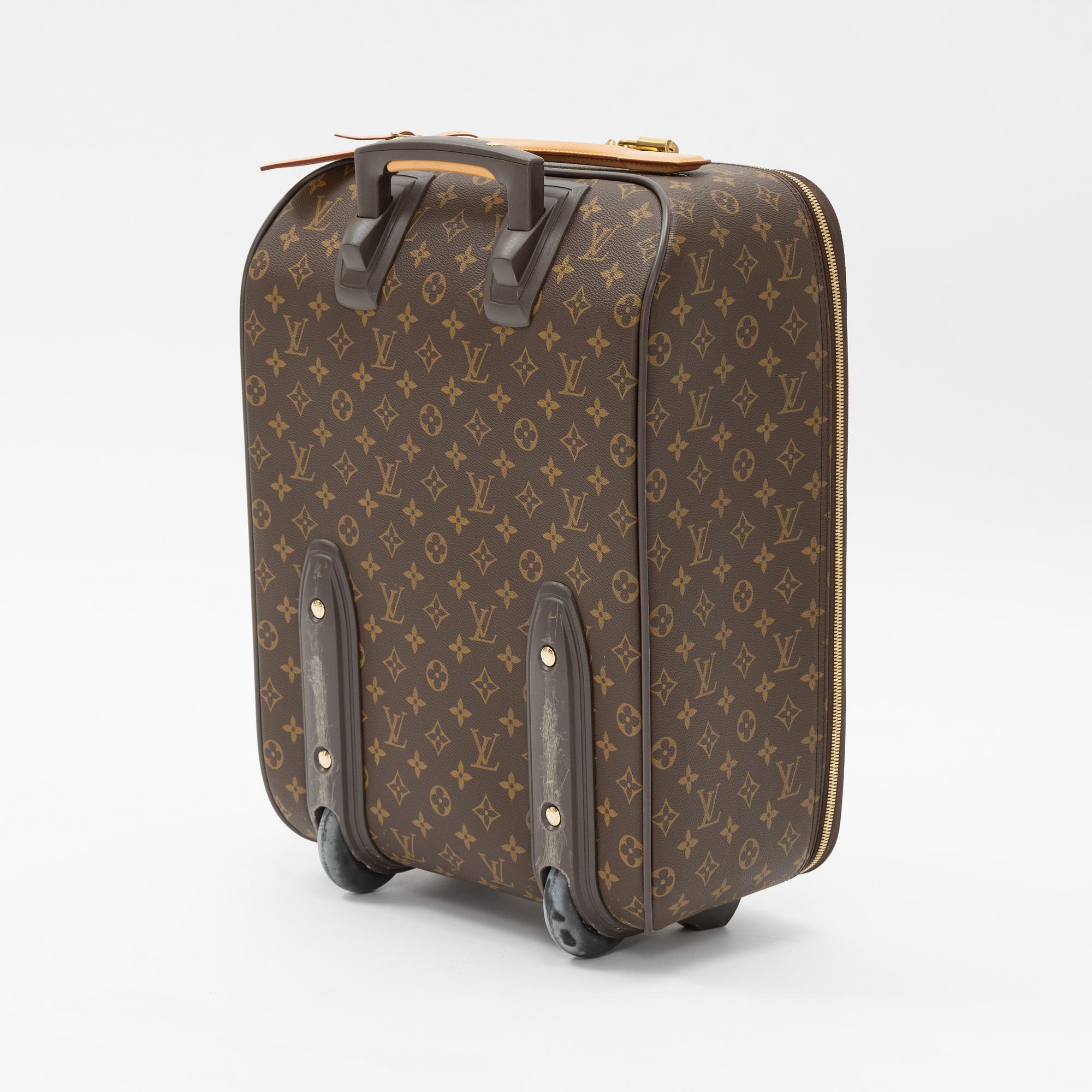 Louis Vuitton, a monogram canvas 'Pégase 50' suitcase, 203.