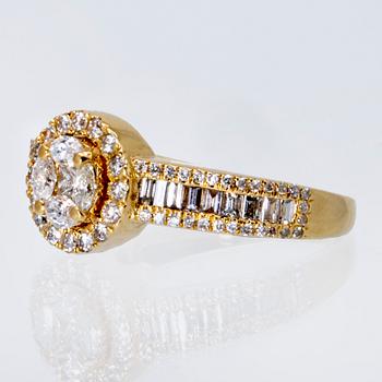 Ring 18K gold navette, brilliant and baguette-cut diamonds approx 1,5 ct in total.