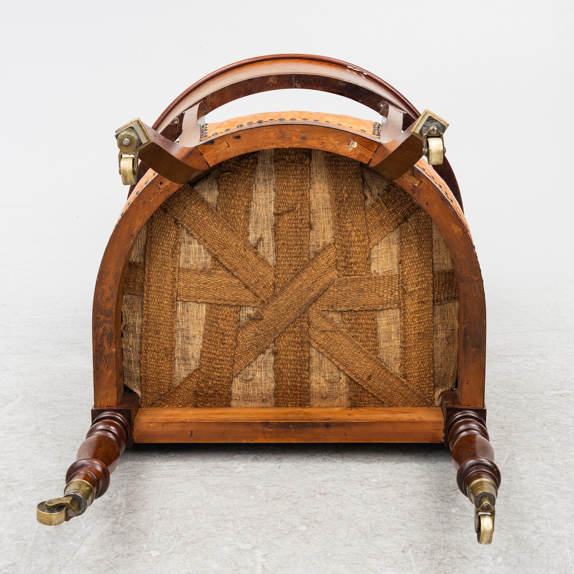 An Empire armchair, 19th century.