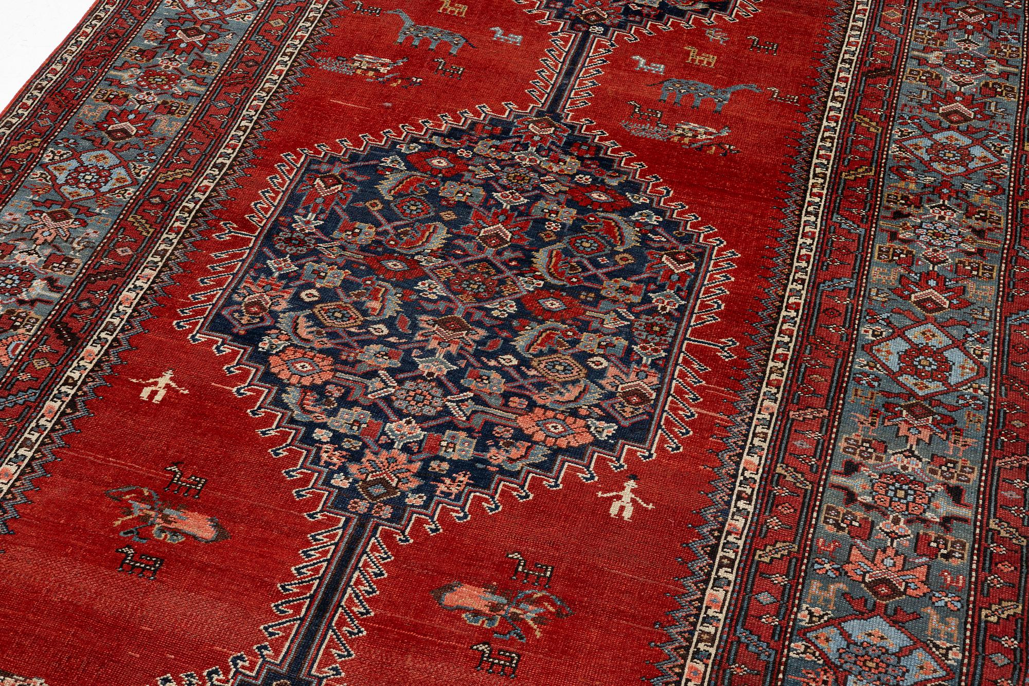 A Malayer runner, west Persia, c. 560 x 200 cm.