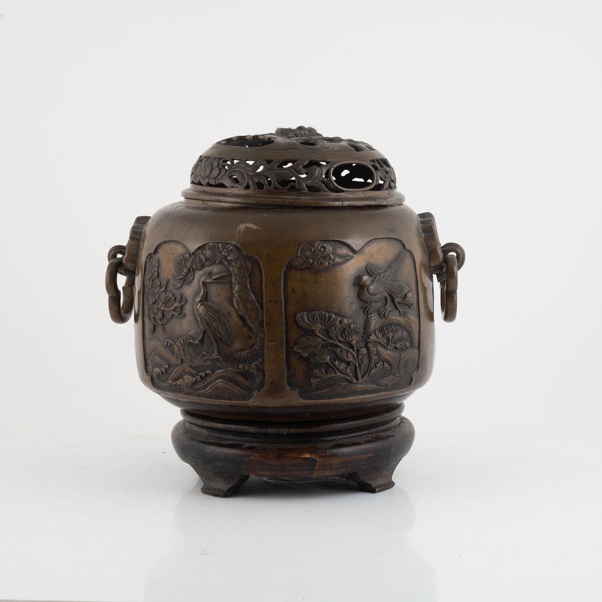 A bronze urn with stand, Japan, presumably Meiji (1868-1912).