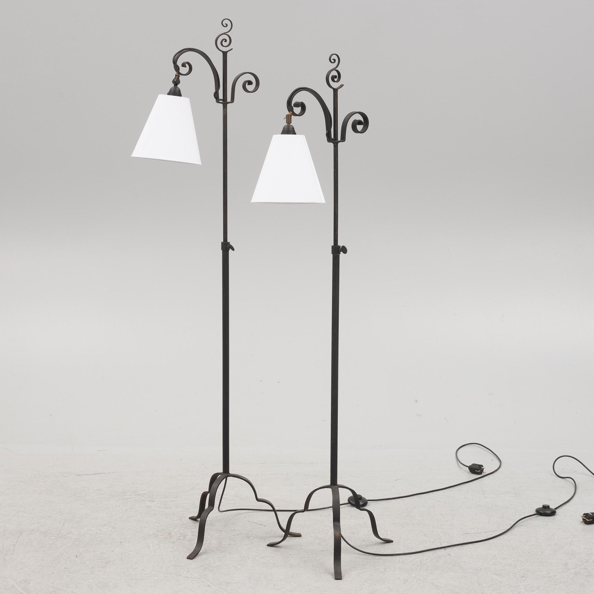 Harald Notini, a pair of wrought iron floor lamps, model '15101', Arvid Böhlmarks Lampfabrik, 1930's.