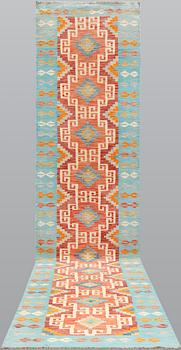 A kilim runner, ca 492 x 100 cm.