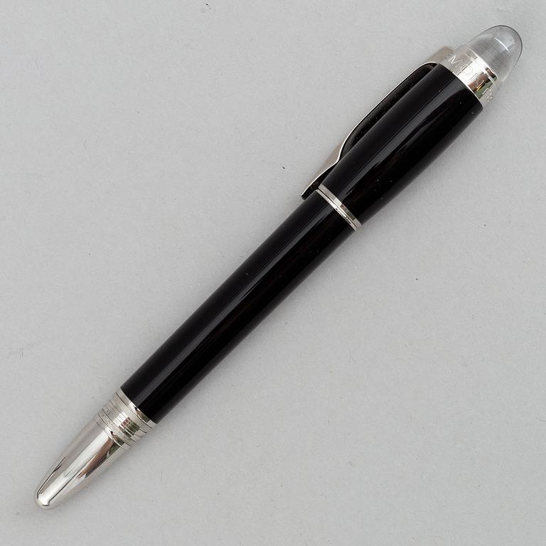 MOntblanc, a ball point pen and leather passport holder.
