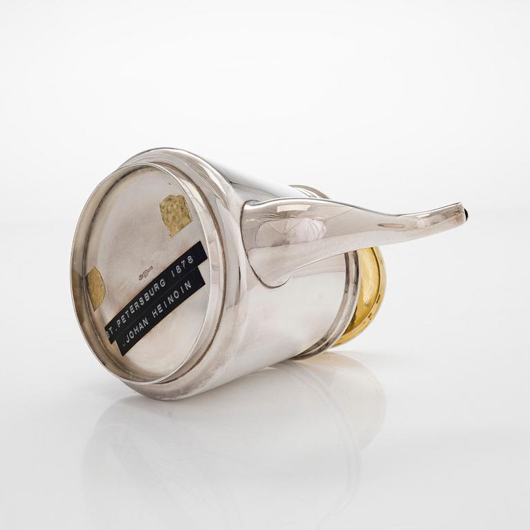 A 19th-century parcel-gilt silver teapot, maker's mark of Johan Heinoin, Saint Petersburg 1878.