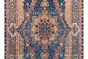 A Kerman Laver carpet, c. 252 x 150 cm.