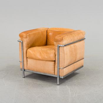 A 'LC3' easy chair by Pierre Jeanneret & Charlotte Perriand. Le Corbusier for Cassina.