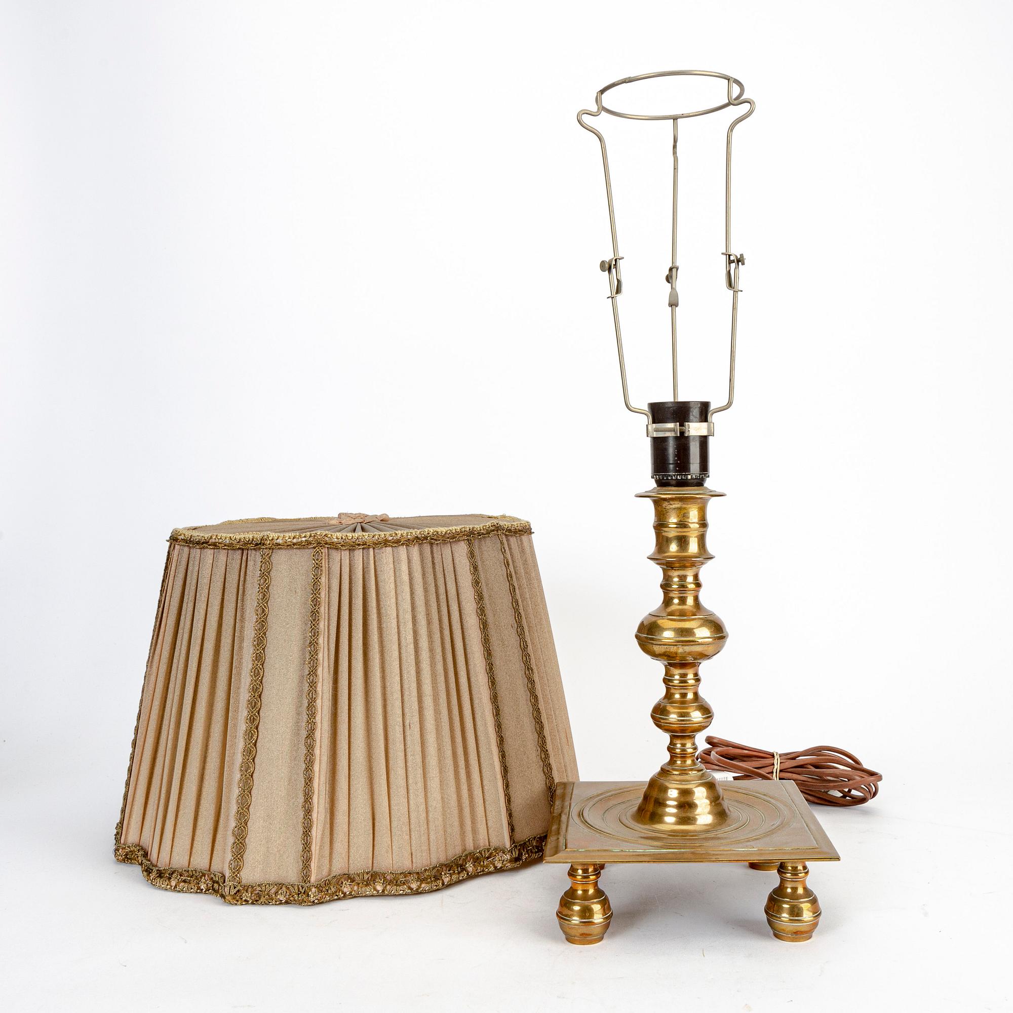 A set of two bronze 1930/40s Baroque style table lamps.