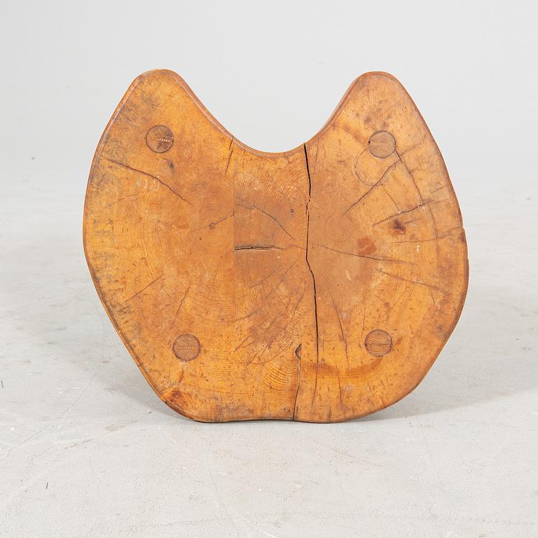 A pine wood stool, second half of the 20th Century.
