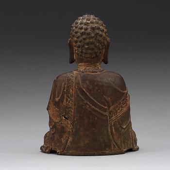 A bronze figure of a seated Buddha, Ming dynasty (1368-1644).