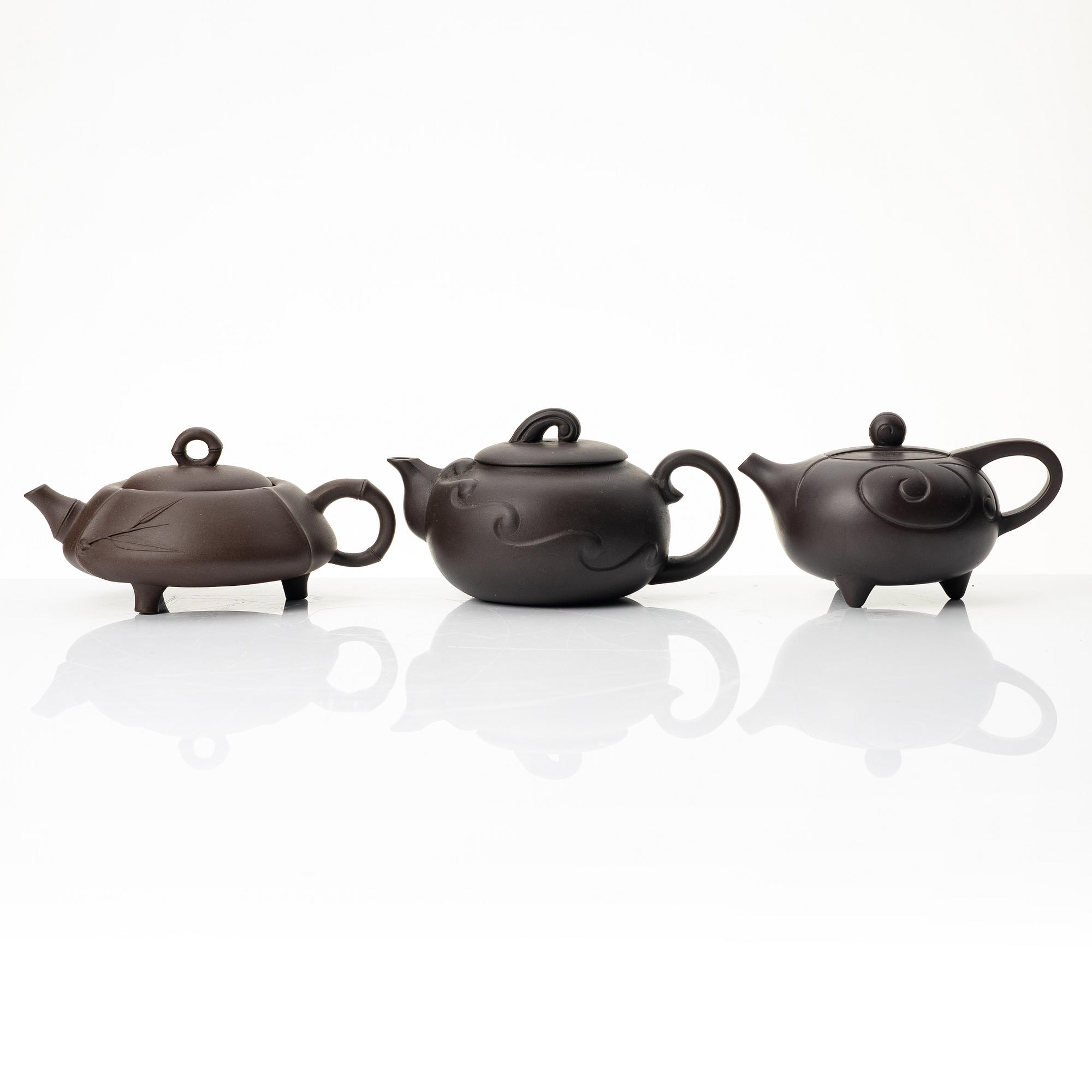 A group of four Chinese brown yixing teapots, 1980/90s.