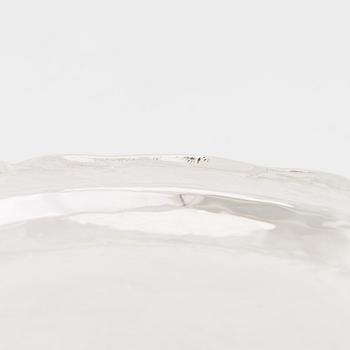 A 12-piece set of sterling silver dishes / coasters, Peru 1950s-60s.