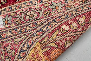 A rug, semi-antique Kerman laver, figural, ca 82 x 59 cm.