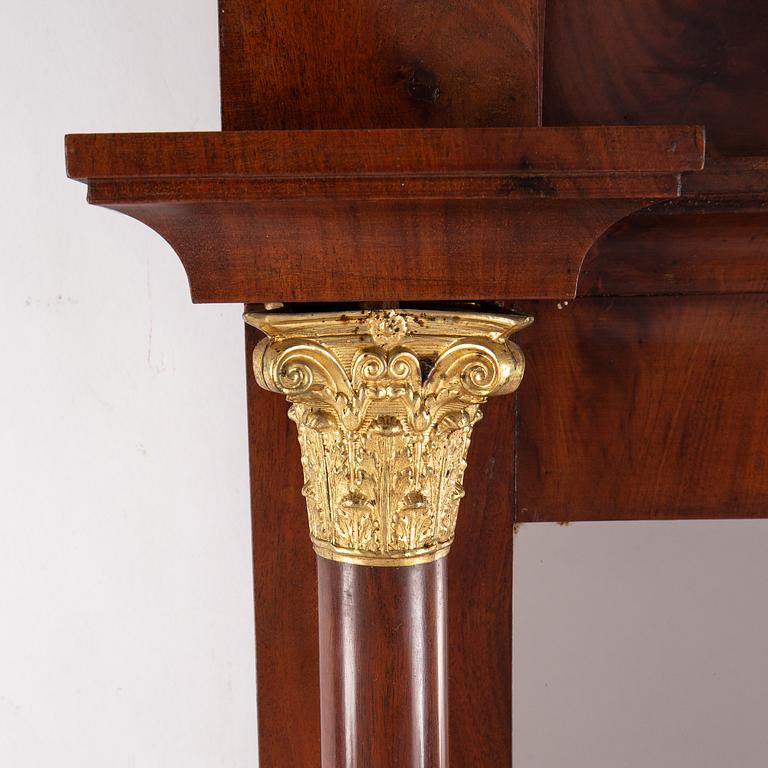 An Empire mirror and console table, first half of the 19th century.