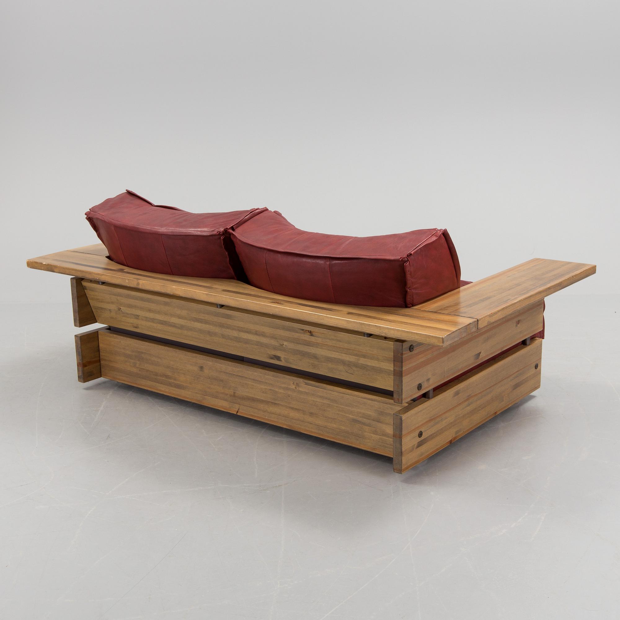 A Hämeen Kalustaja Finnish stained pine sofa, 1970's.