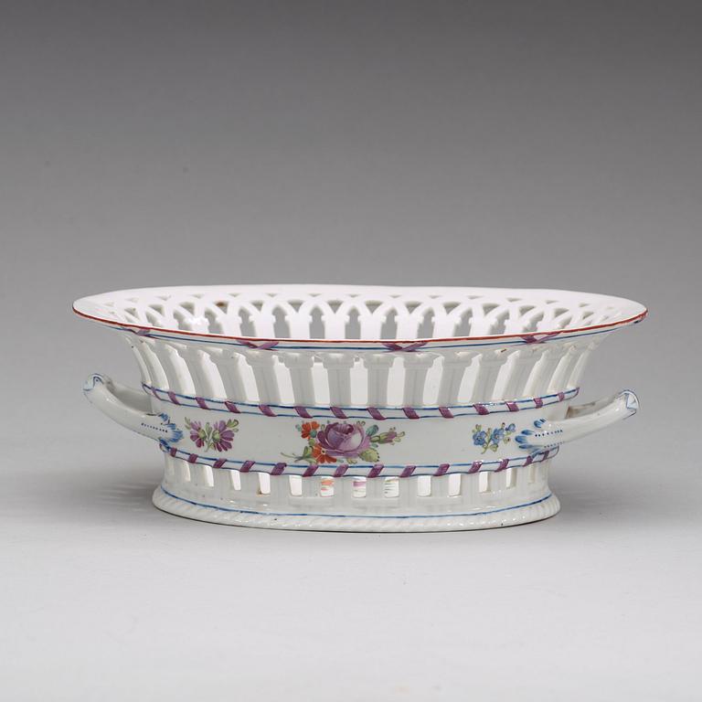 A Russian chesnut basket and stand, Imperial Porcelain Manufactory, St Petersburg, period of Alexander I (1801-25).