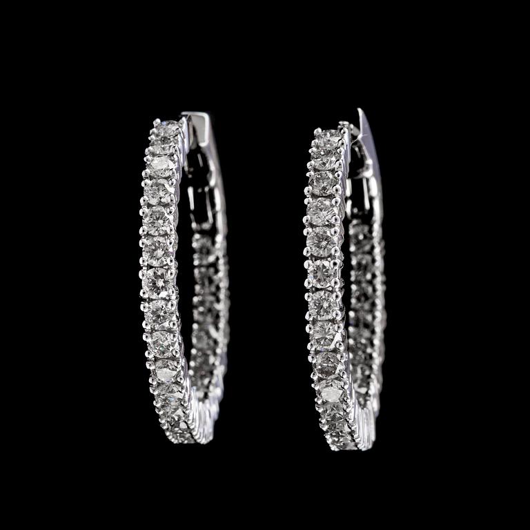 A pair of brilliant cut diamond earrings, tot. 1.97 cts.