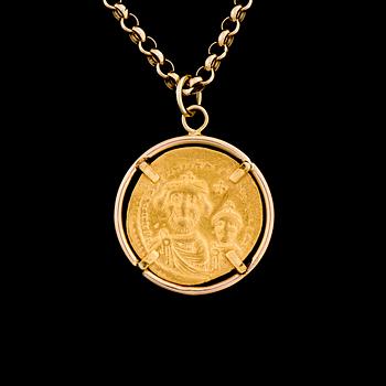 A PENDANT, Byzantine coin 20K gold, set in 14K gold frame.