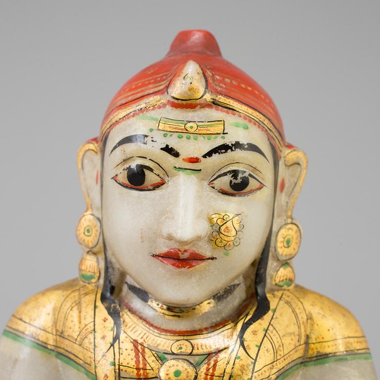 An alabaster sculpture of a deity, India, 20th Century.