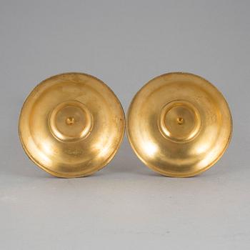 LJUSSTAKAR ett par, Förgylld brons. Senempire Frankrike, 1800-talets mitt.