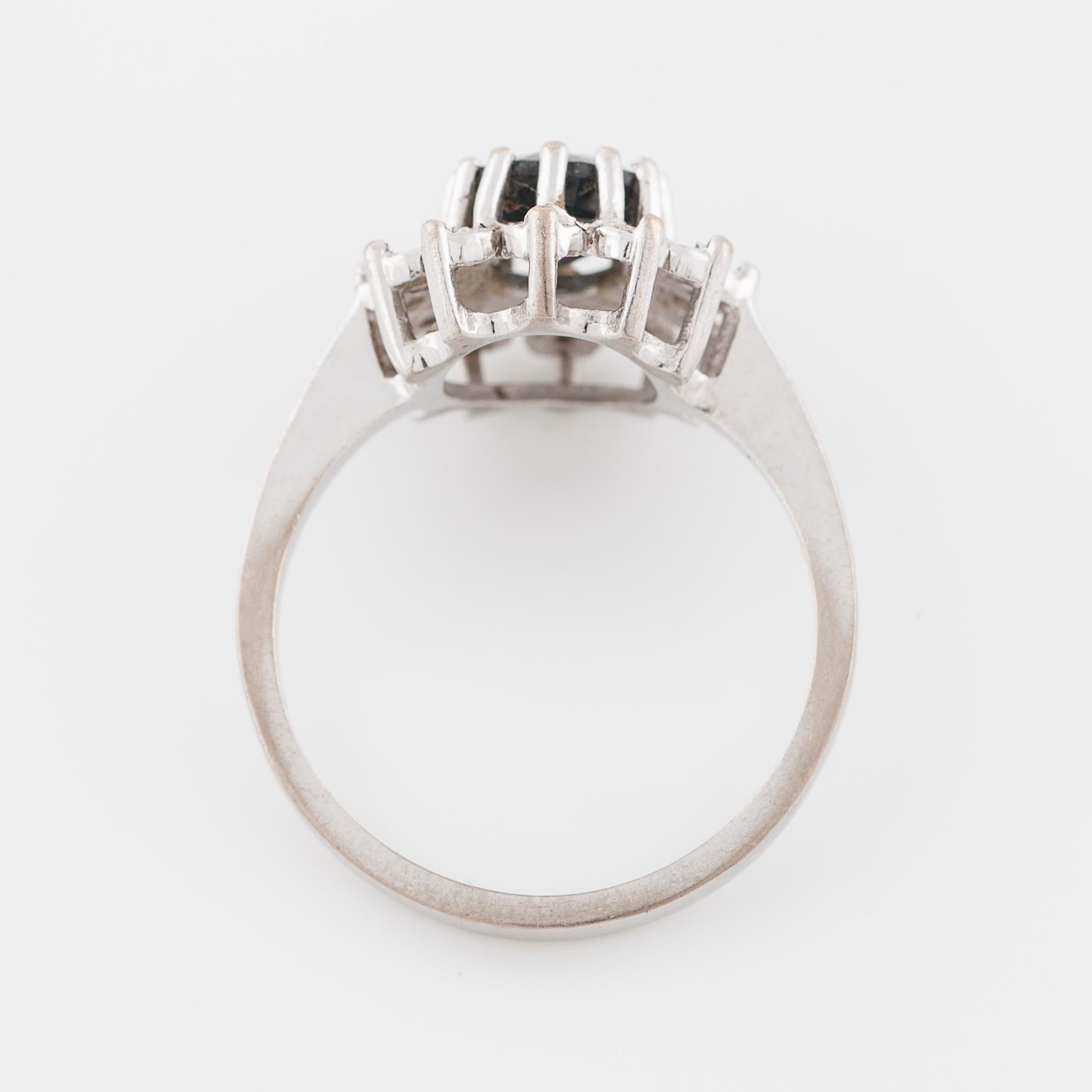 A sapphire and brilliant cut diamond ring with Swedish hallmark.