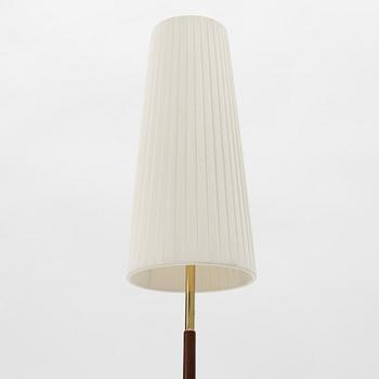 A 1960s teak floor lamp.