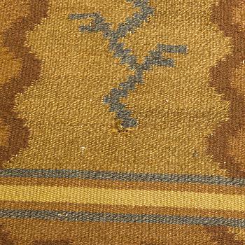 Aino Keinänen-Baeckmann, A 1920s Finnish flat weave carpet. Circa 300 x 203 cm.