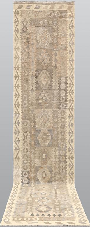 A Kilim runner, approx. 438 x 88 cm.