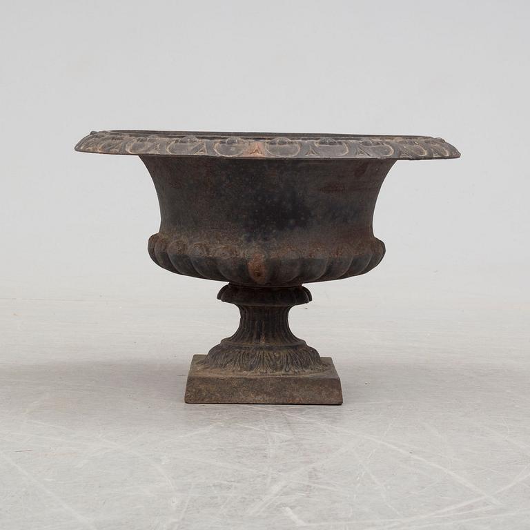 An early 20th century iron garden urn.