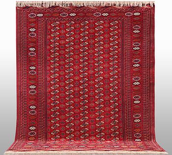 A carpet, semi-antique Tekke, ca 330 x 250 cm.