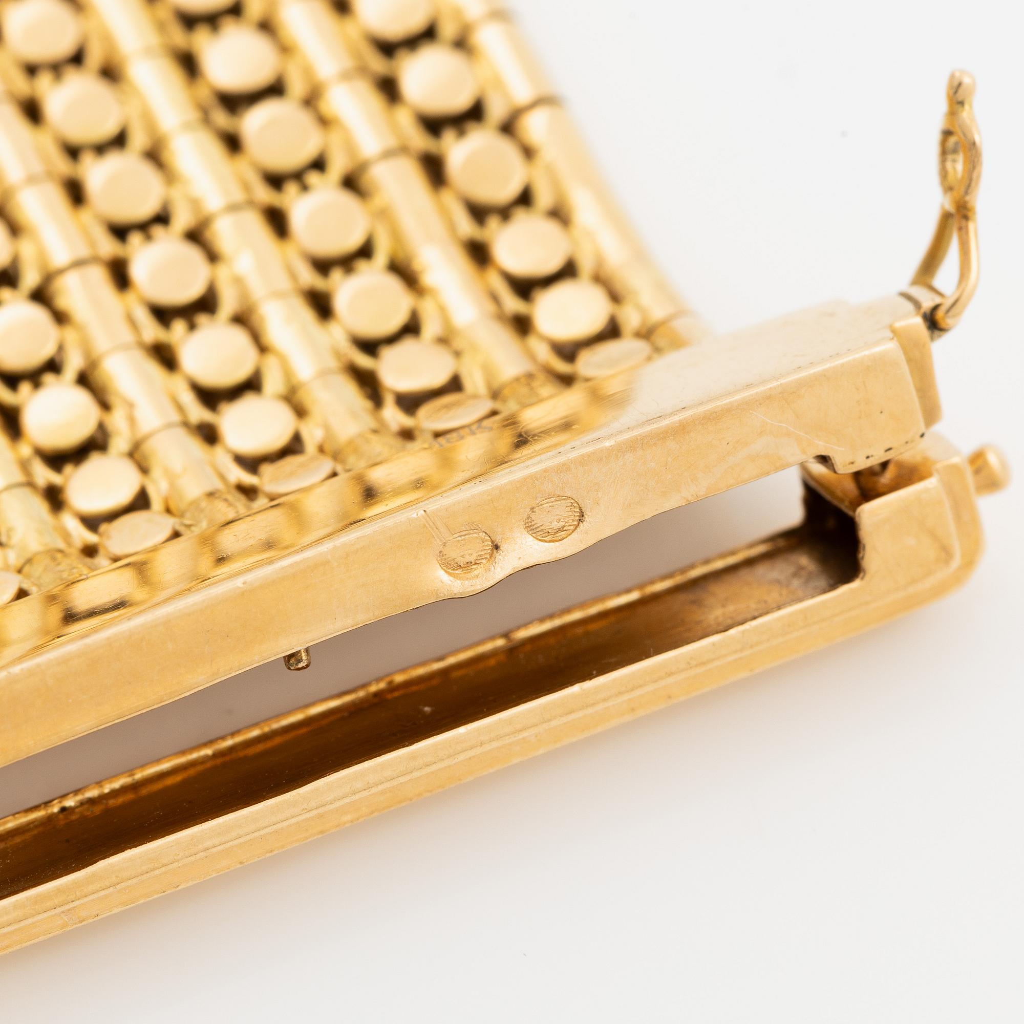 Armband 18K guld med tofs, 1900-talets andra hälft.