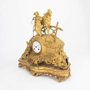 A late 19th century gilded table clock.