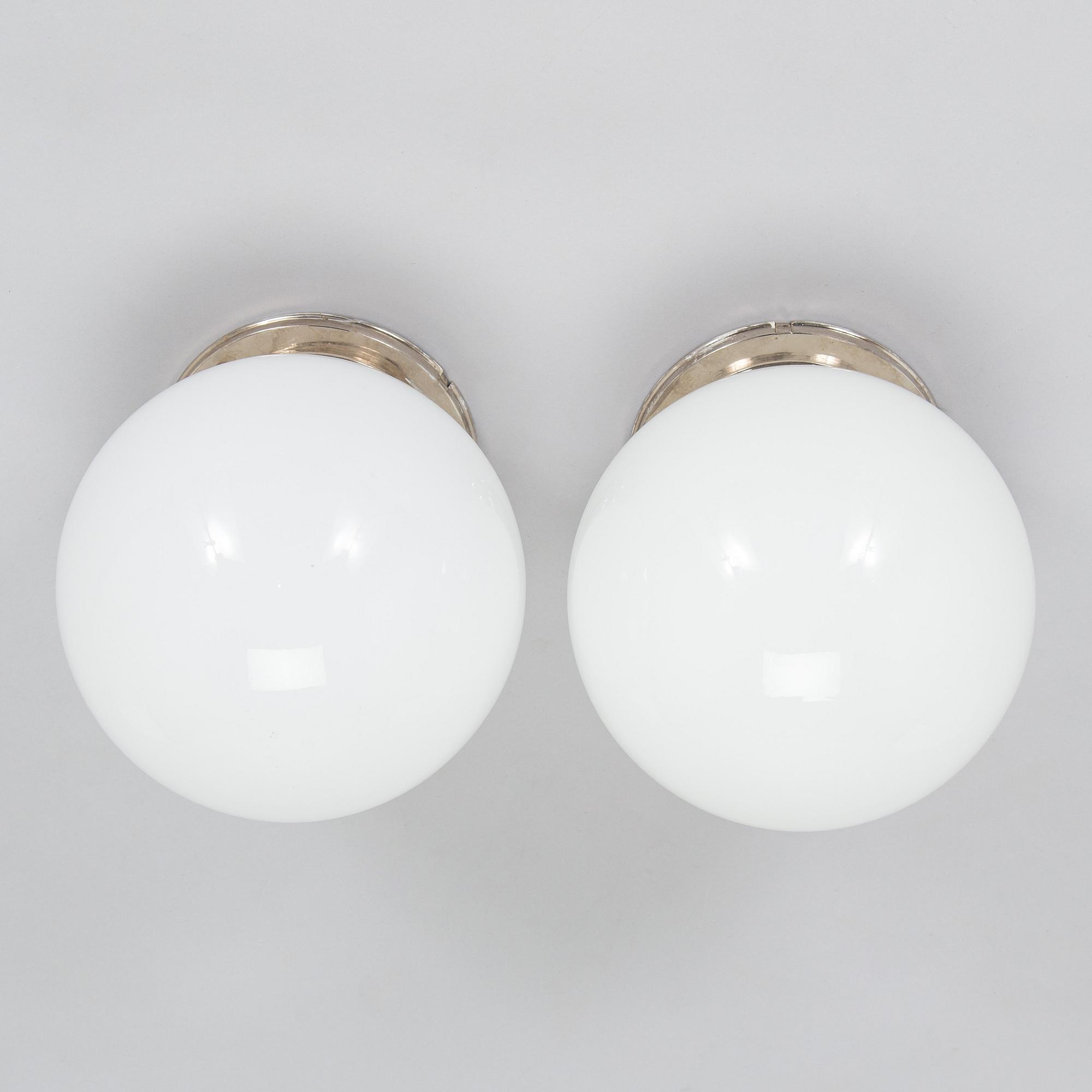 A pair of 1930s ceiling lights.