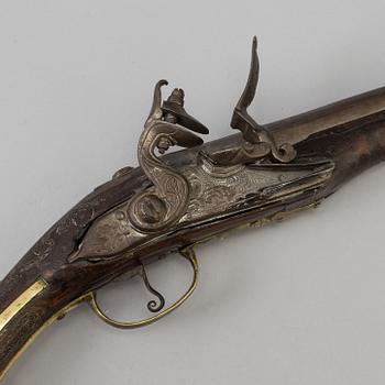 A 19th century flintlock pistol probably from the Ottoman Empire.