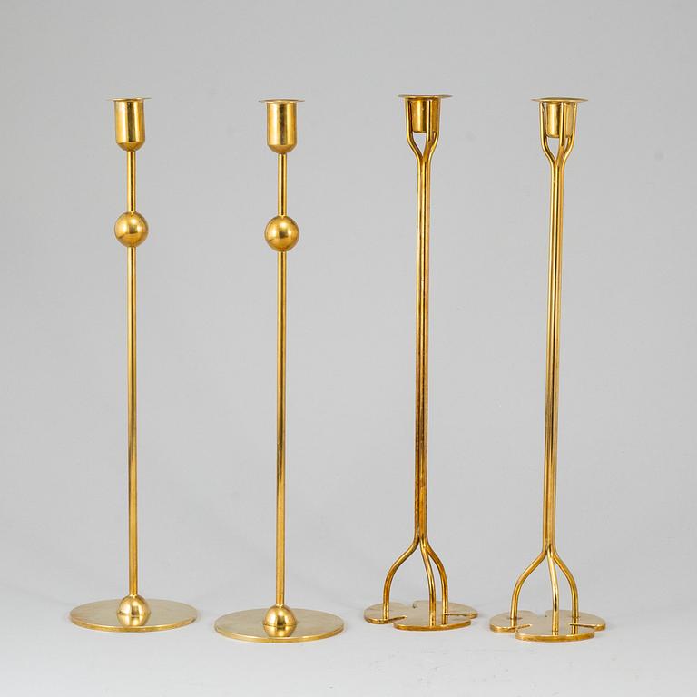 FIRMA SVENSKT TENN, 2+2 brass candlesticks. Designed by Estrid Ericson and Josef Frank.