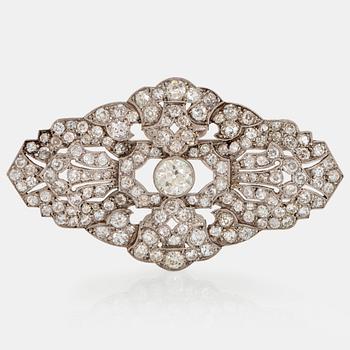 A platinum brooch set with old-cut diamonds with a total weight of ca 6.50 cts.