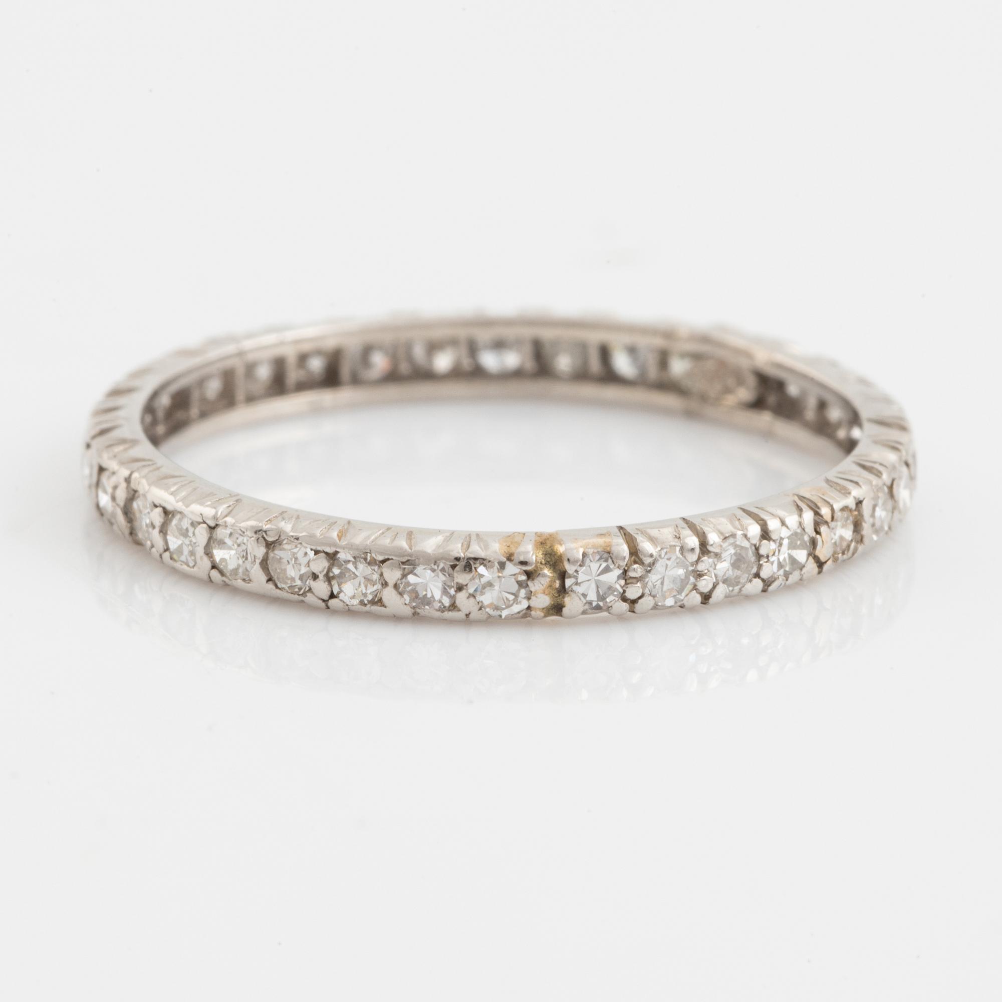 Platinum and eight cut diamond ring.