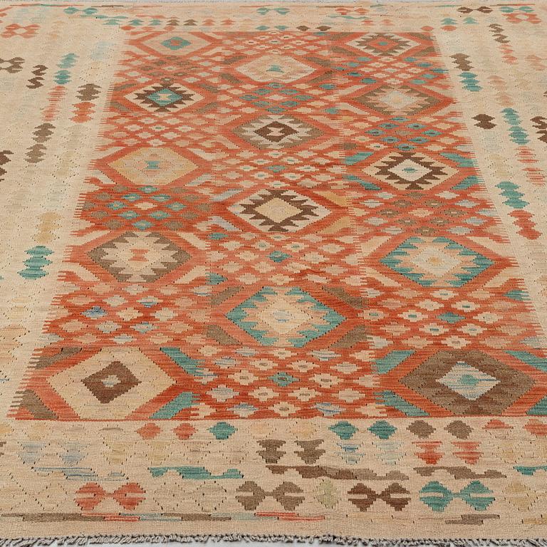 a carpet, kilim, around 298 x 196 cm.