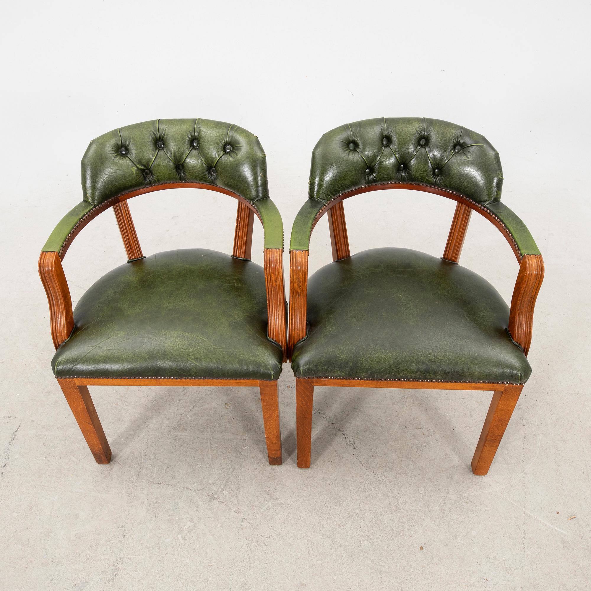 A pair of leather armchairs from the second half of the 20th century.