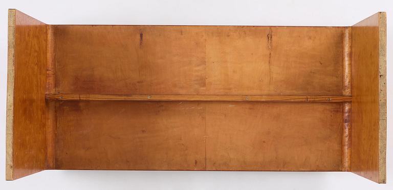 Swedish Modern, a birch veneered coffee table, 1930s-40s.