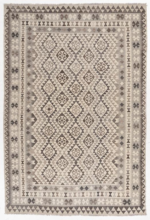 A Kelim carpet, a. 295 x 200 cm.