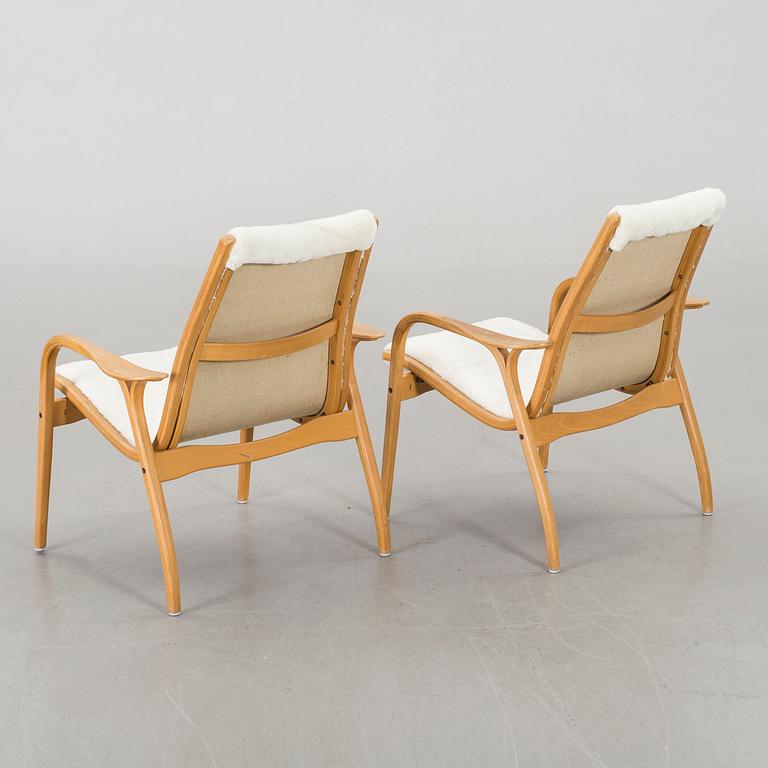 YNGVE EKSTRÖM, a set of two Laminett easy chairs.