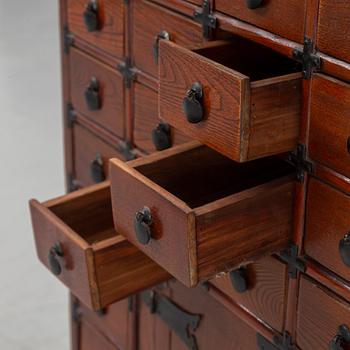 A contemporary Chinese spice cupboard.
