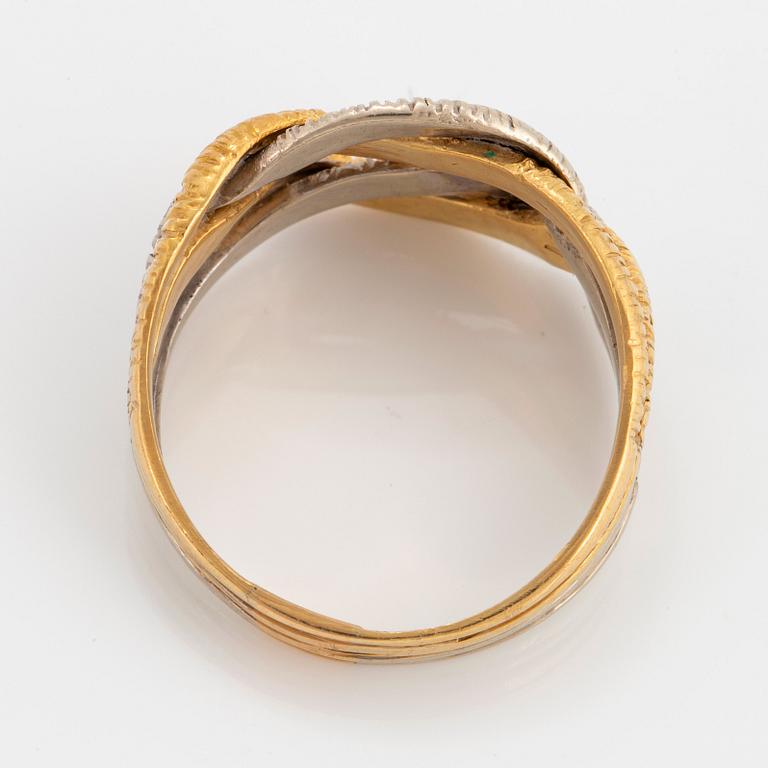 An 18K gold and white gold ring.