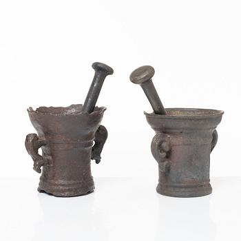 A set of two renaissance-type cast-iron mortars, 17th century.