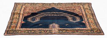 A Senneh saddle cover, North West Persia, ca 80 ,5 x 92,5  cm.