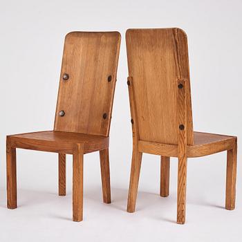 Axel Einar Hjorth, a set of four "Lovö" stained pine chairs, Nordiska Kompaniet 1930s.