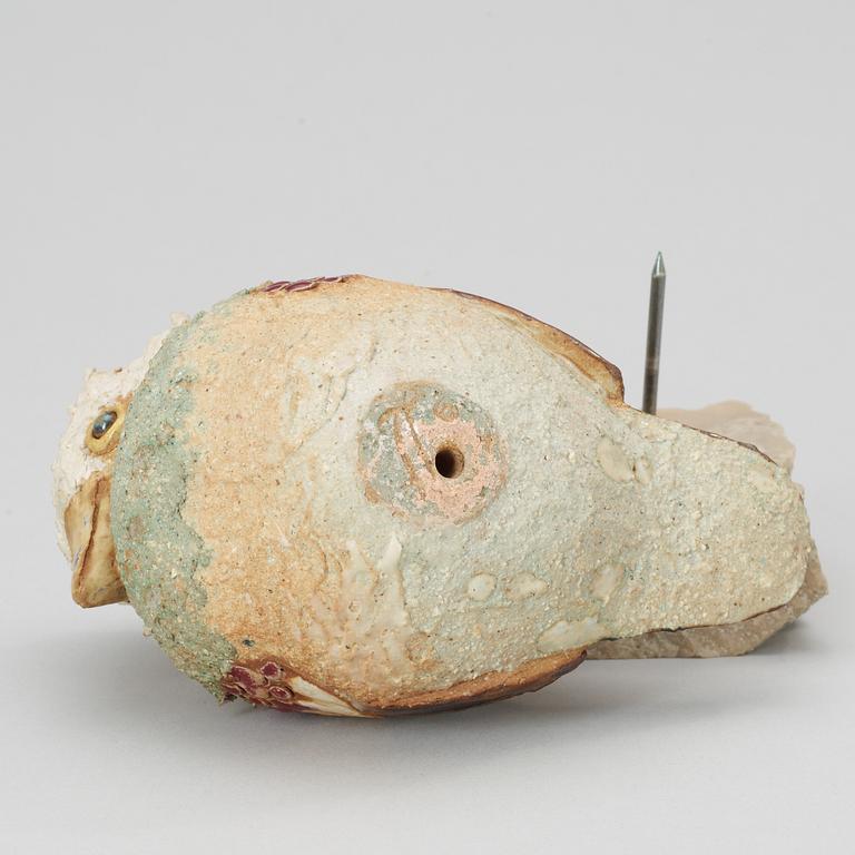 A Tyra Lundgren stoneware figure of a bird.