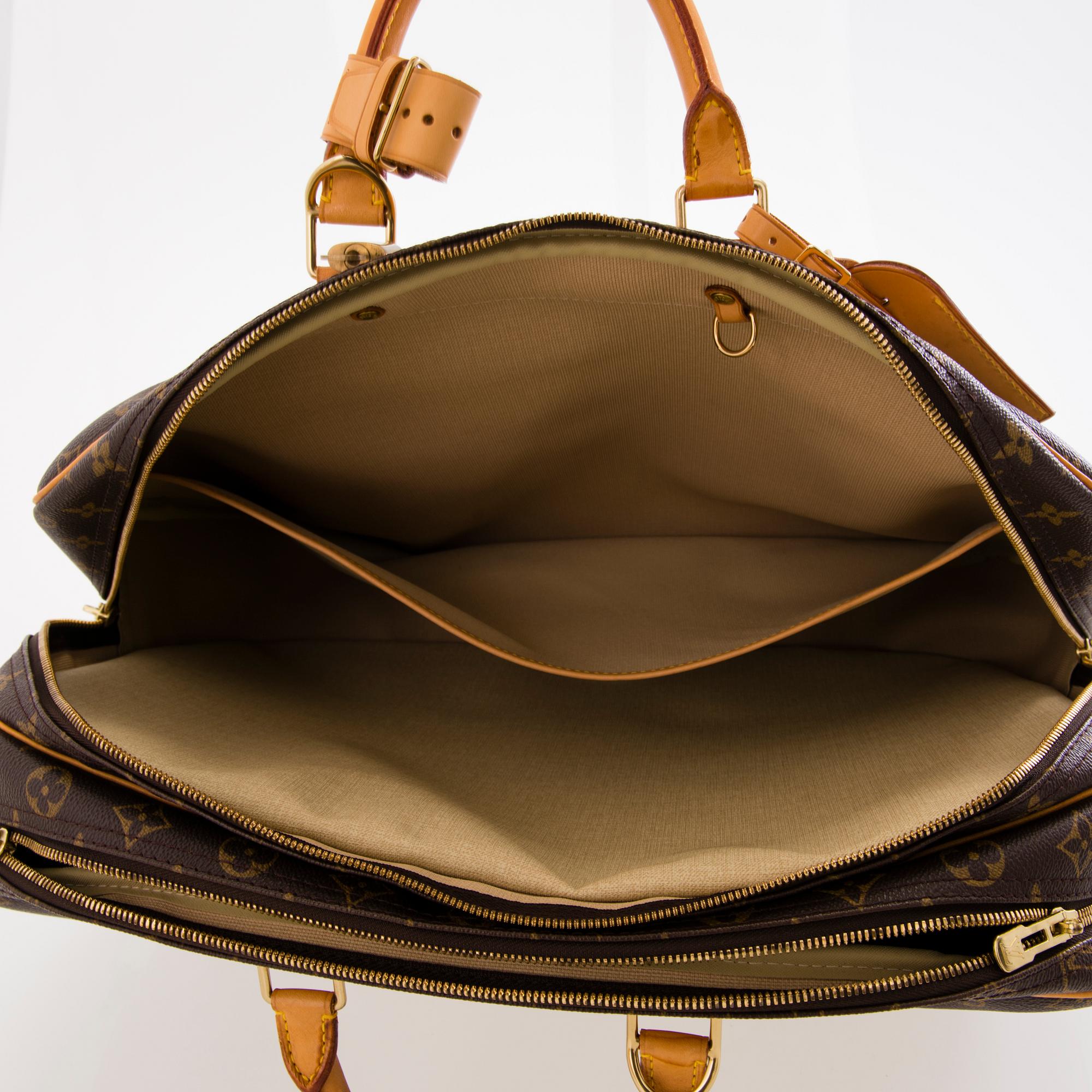 LOUIS VUITTON Alize 24 Heures Travel Bag.